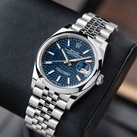 rolex bleu or|rolex blue motif.